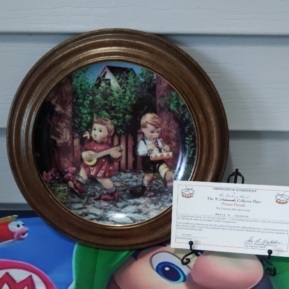 "Private Parade" Collector  Wall Plate in Brown with Children’s Music Scene